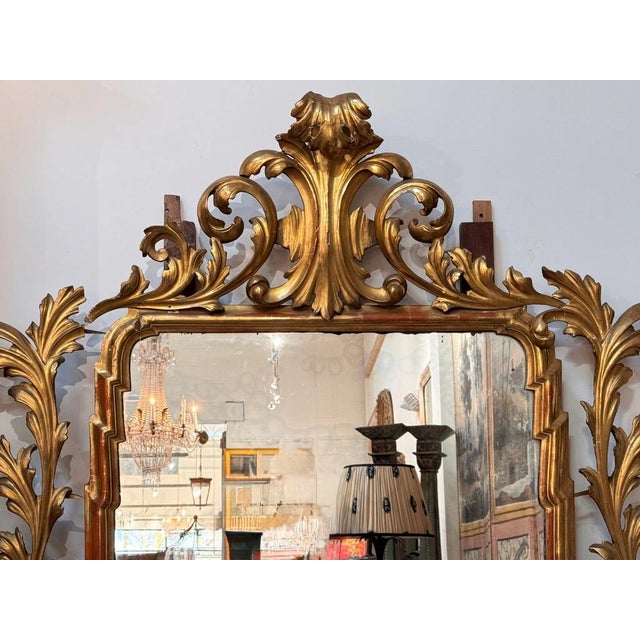 Beautiful, grand 18th Century Italian mirror, the early rectangular mirror plate framed with carved and gilded scroll and...