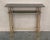 Mid-Century Modern Italian faux bamboo gilt metal console table or vanity with smoked glass. Measures: Total height: 32in...