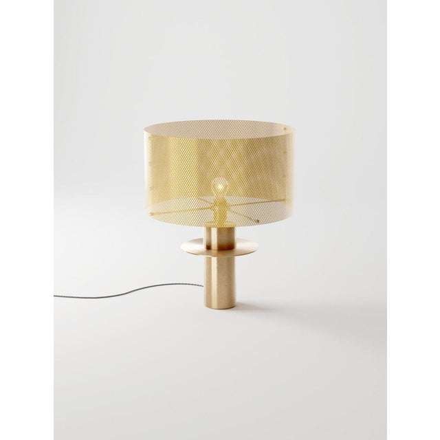 Atahualpa table lamp in solid brass & stainless steel by studio marine breynaert. Dimensions: ø 27 × h 34 cm. Materials:...