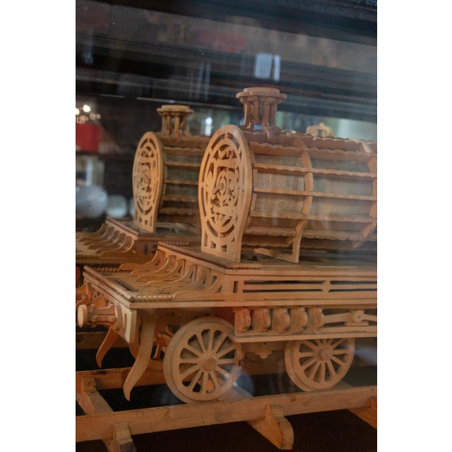 Carved Wood Model of a Locomotive in Black Lacquered and Glass Case For Sale - Image 4 of 5