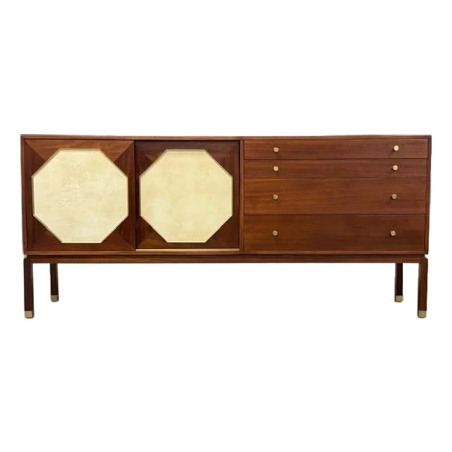 Mid-century modern wooden sideboard with octagonal cream panels and gold hardware