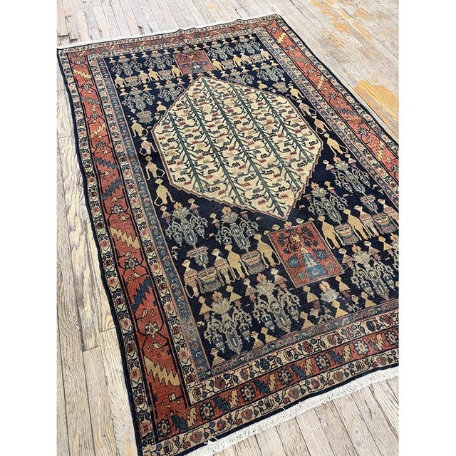 "Dating back to circa 1890, this Antique Senneh rug is a stunning representation of late 19th-century formal weaving from...