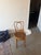 Authentic Thonet bentwood side chair featuring the original Thonet Wien paper label and an embossed wood seat with...