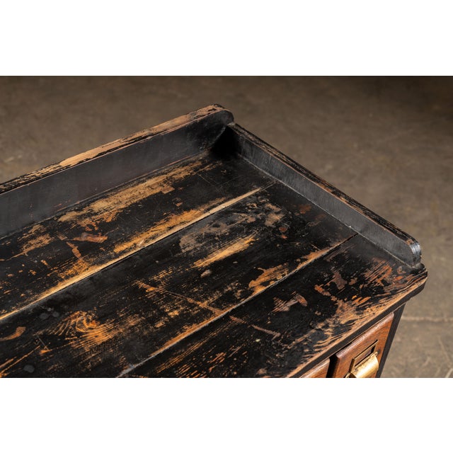 Early 20th Century Wooden 14 Drawer Rolling Shop Cabinet in Distressed Black For Sale In Chicago - Image 6 of 10