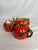 This lovely hand painted pumpkin tea set is a beautiful way to brighten up a space. The lid from the tea pot is missing...