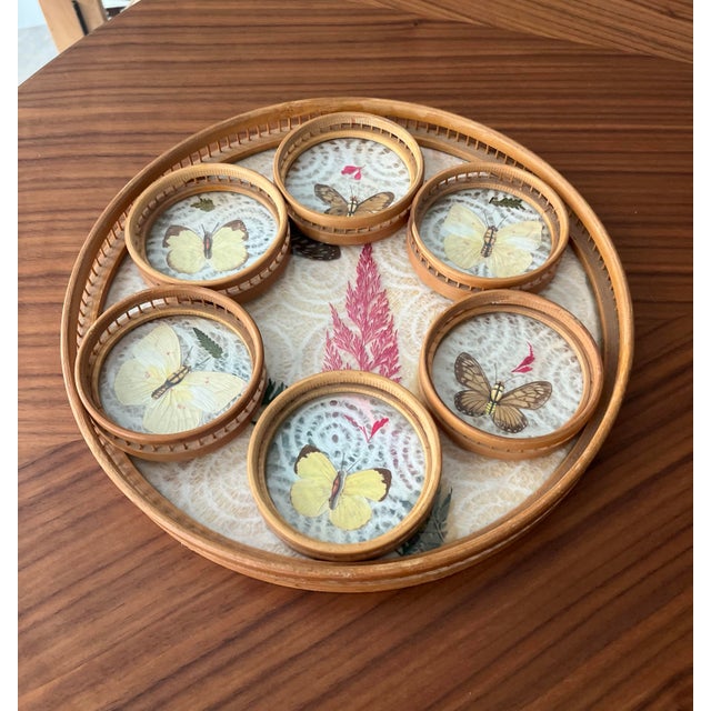 One tray and six coasters adorned with beautiful, sixty-year-old, butterflies positioned on a bed of lace. Bring a touch...