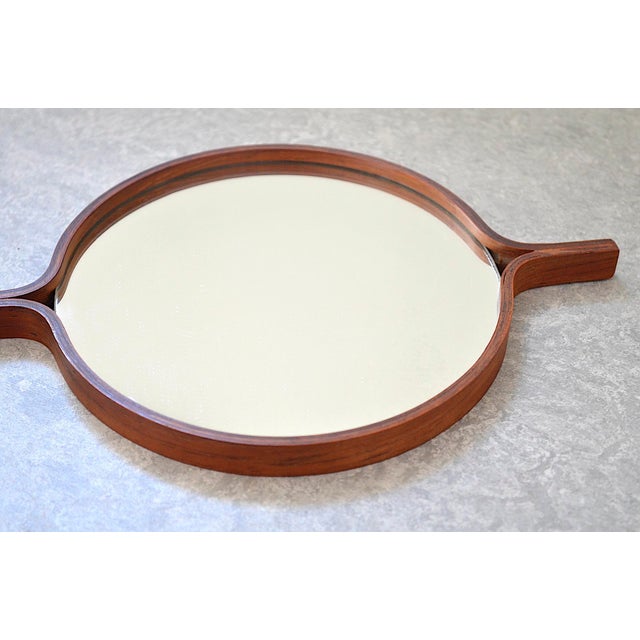Very nice, high-quality hand mirror or table mirror from Bech & Starup for Den Permanente from the 1960s. The mirror was...