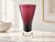 Elegant glass vase, model 1369 "Flindell," designed by Tamara Aladin for Riihimäen Lasi in Finland. The harmonious color...