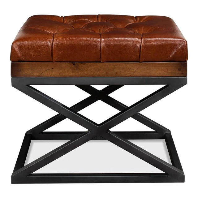 A modern tufted leather X frame stool, classic meets contemporary with this versatile piece. The top boxed cushion is...