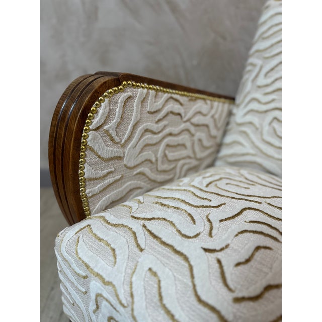 Elegant Art Deco armchair, fully restored in our workshops, combining sculptural lines with contemporary comfort. This...