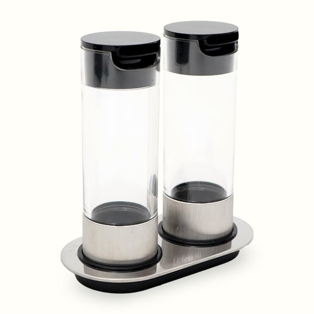 Set of italian-made oil and vinegar produced by cini and nils in the 1960s based on a design by studio opi (franco...