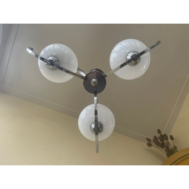 A very rare Art Deco lamp from 1930 from France. We have never before come across a lamp like this, decorated with 3...