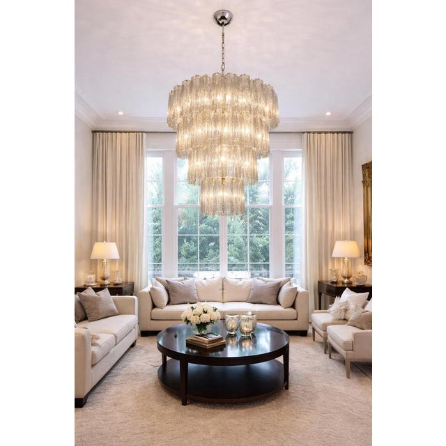 Italian vintage chandelier in Murano glass and nickel plated metal structure on 4 levels. The armor polished nickel...