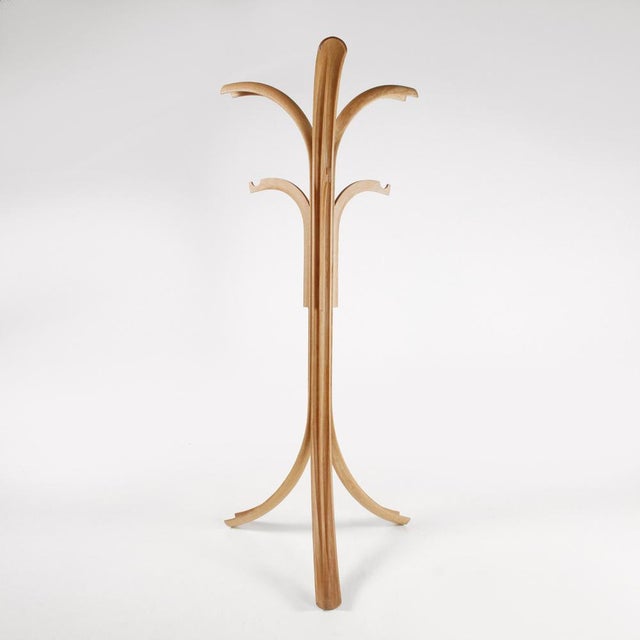 Floor coat rack designed in the 1970s by Giovanni Offredi for Crassevig, made entirely of curved ash wood. The item is in...