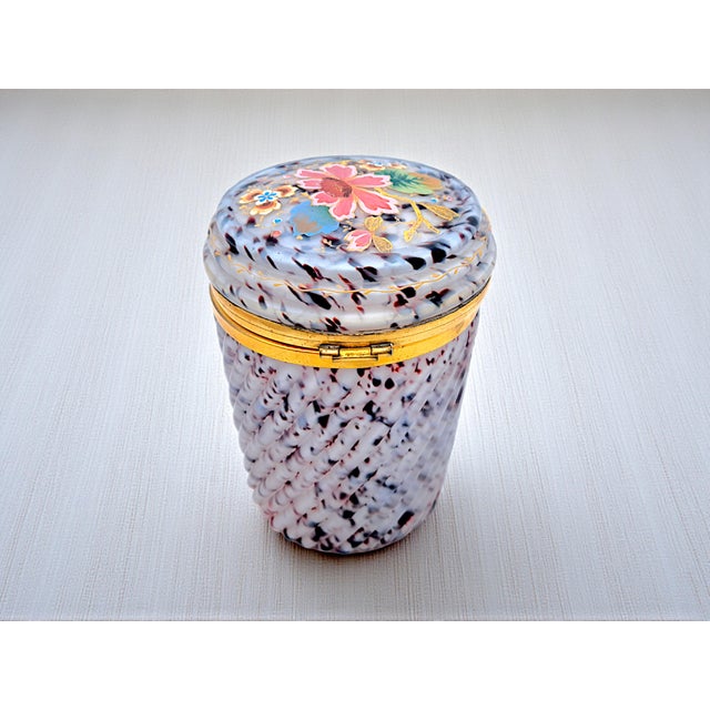 Store your little treasures in this charming antique jewelry box, a magnificent example of French Opaline glass (likely...