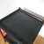 Italian postmodern side table with a red lacquered metal frame and two black plastic surfaces. Designed by Boccato,...