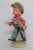 This wonderful figurine is made of porcelain. This adorable figurine is stamped as being designed by Erich Stauffer with...