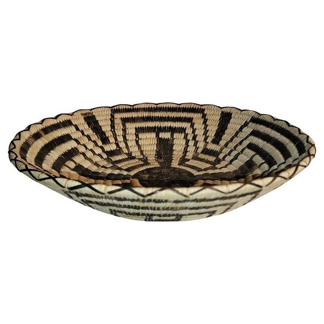 This amazing large geometric hand woven basket is most unusual and in pristine condition. Late but great basket !