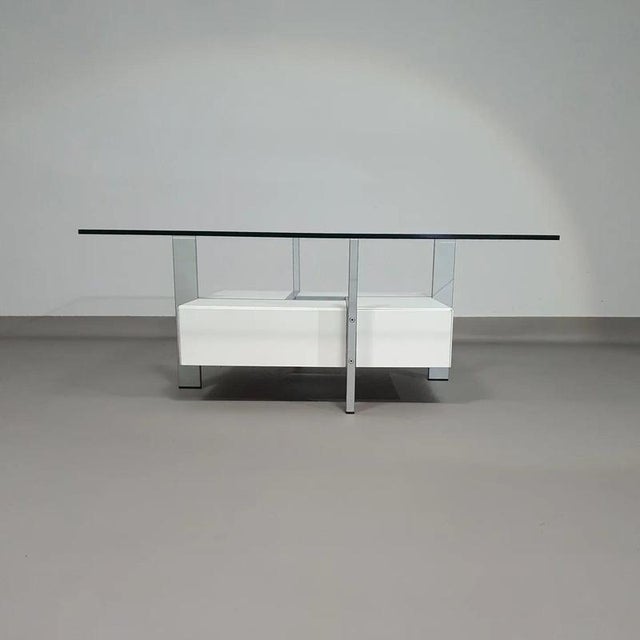 Minimalistic coffee table with drawers 80's Minimalistic coffee table with drawers 80's Glass top 100 x 100 cm Height 40 cm