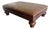 Spanish Colonial Style Embossed Leather Ottoman With Bun Feet For Sale
