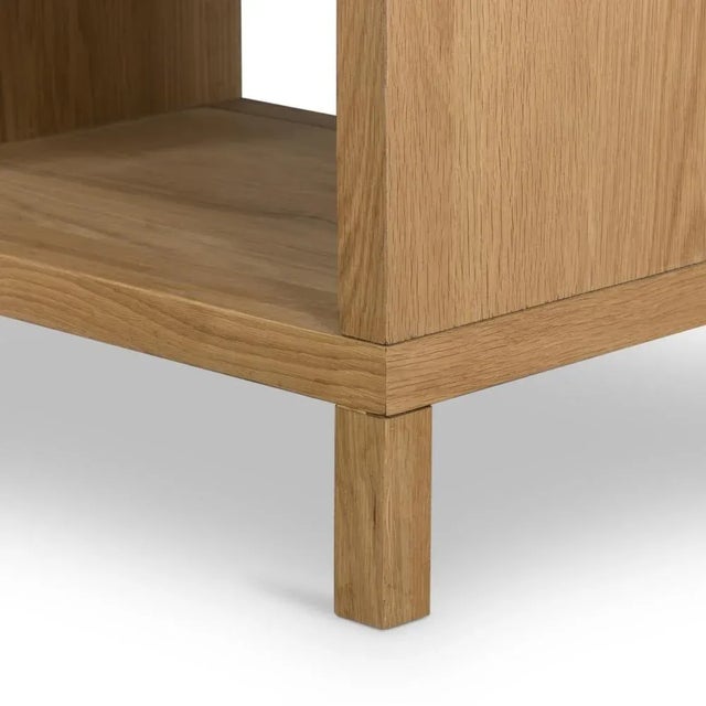 Au naturale. A nightstand of honey-finished oak features a single drawer with a wood-backed cane front, for a soft,...