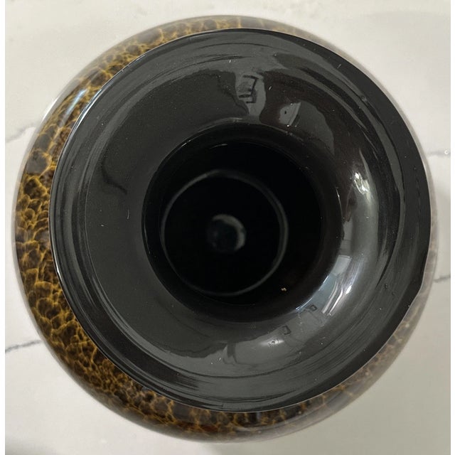 Add a touch of Italian elegance to your space with this stunning vintage Murano-style art glass vase, attributed to...