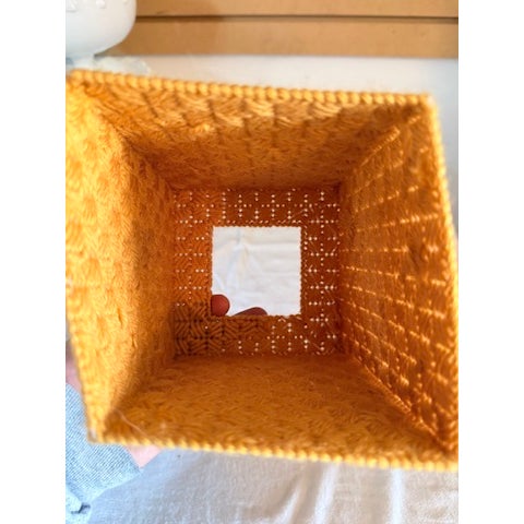Handmade Burnt Yellow Tissue Cover. Plastic grid mesh stitched with dark yellow yarn. It can stand up just fine around the...