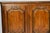 A substantial and beautifully crafted French Provincial style walnut buffet by Baker Furniture, dating to approximately...