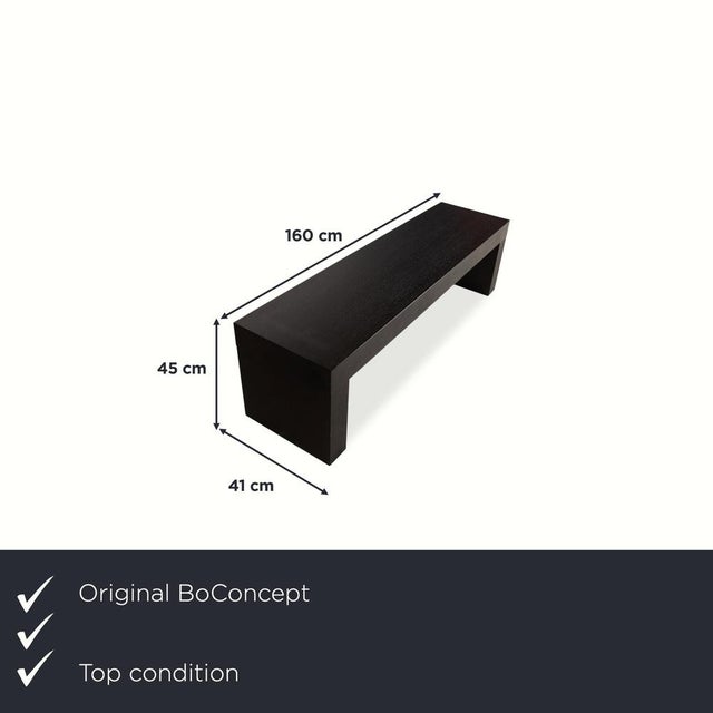 This black bench from BoConcept brings a touch of casual style to your dining room. The design eschews unnecessary...