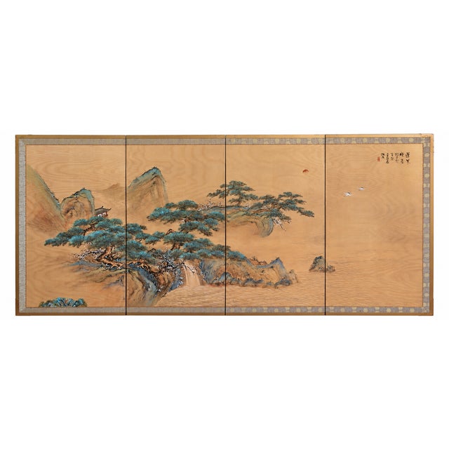 An exceptional four-panel folding screen depicting an expansive mountain landscape in the classical East Asian tradition,...
