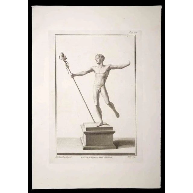 Ancient Roman Statue, from the series "Antiquities of Herculaneum", is an original etching on paper realized by Carlo...