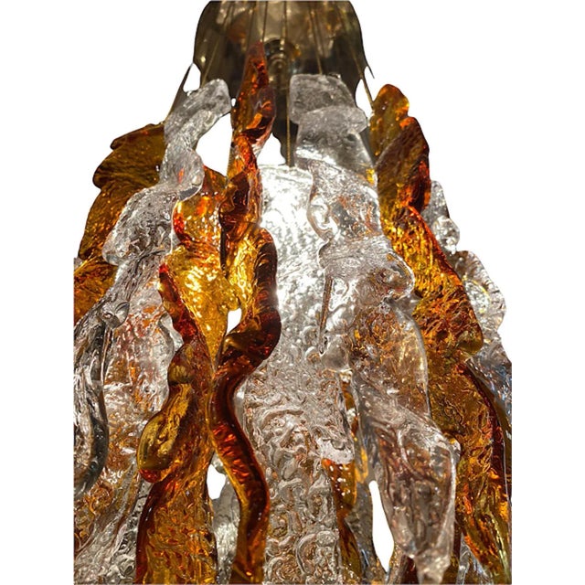 Exceptional cascade pendant with large glass Murano oversized around 40 cm with gilt gold structure. The Design and the...
