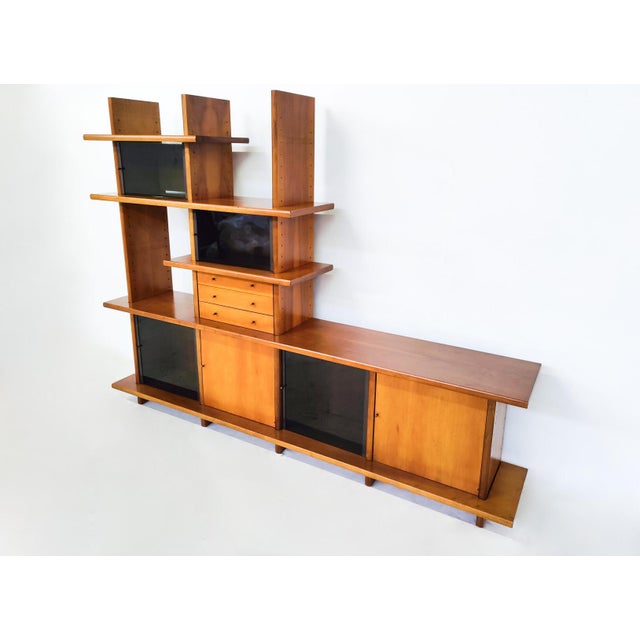Mid-Century Modern Wall Unit by Saporiti, Italy, 1970s. This piece is attributed to the mentioned designer/maker. It has...