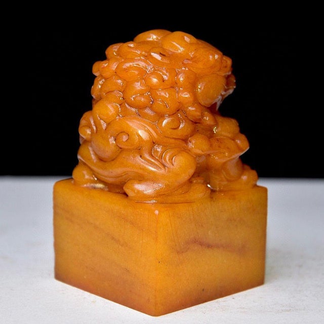 This impressive vintage Chinese seal is carved from Shoushan stone, featuring a rich, warm amber-yellow hue with natural...