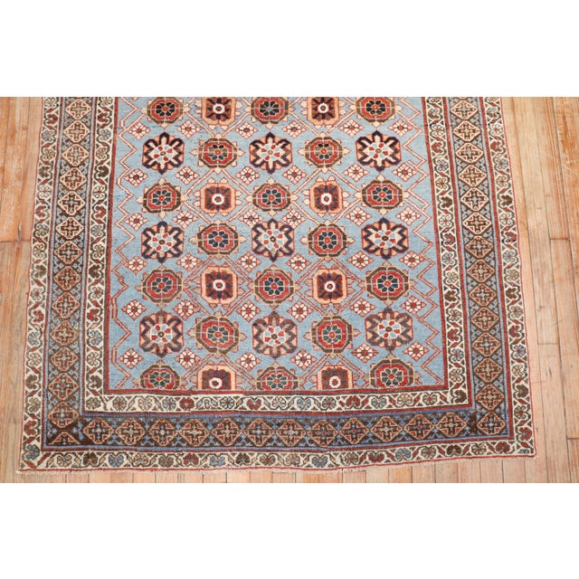 An accent size early 20th century Persian Veramin rug in predominantly blue Measures: 4'4" x 6'4".