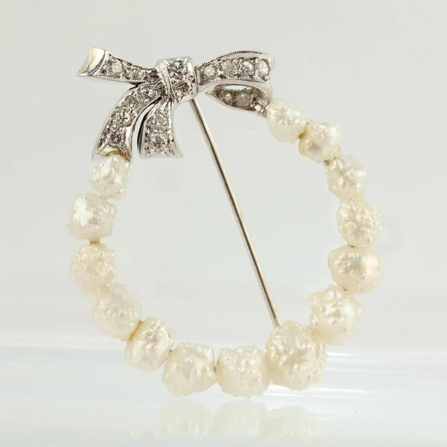 This is part of Chairish’s Fine Jewelry assortment. A very fine antique Edwardian period brooch. Set with 14 graduated...