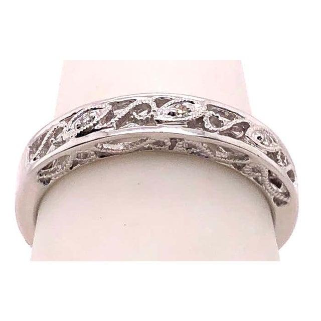 14 Karat White Gold Band Ring with Round Diamonds. Size 6 3.51 grams total weight.