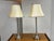 Design Plus Gallery presents a Pari of Silver Candlestick Table Lamps. These tall lamps are great as a duo for your...
