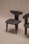 An elegant and characterful pair of Danish modern side chairs designed by Jacob Kielland-Brandt for I. Christiansen,...