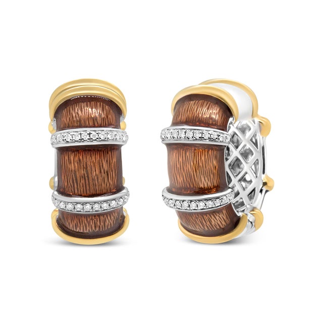 Add color to your jewelry collection with these huggie hoop earrings made from 18k yellow and white gold flash plated .925...