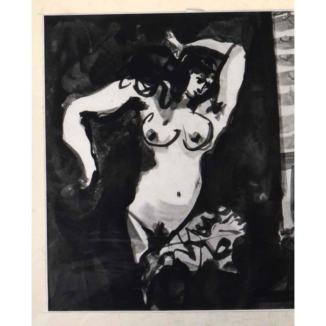 This striking black and white lithograph, measuring 13" x 15", is a powerful depiction of the classic "painter and model"...