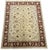 A large hand-knotted area rug featuring an elegant Oushak-inspired floral design in a warm, understated palette. The soft...