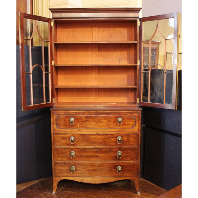 Circa 1790 George III period secretaire bookcase, English. Mahogany. Handsome proportions with unusual glazing to lift the...