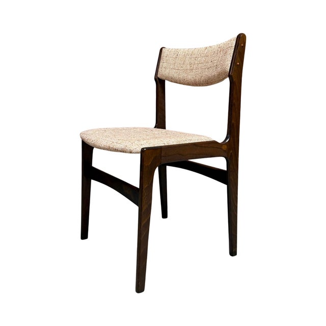 Vintage mid-century Danish modern dining chairs in dark-stained oak by Erik Buch for Nova Stølefabrik, Denmark. Features...
