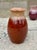 This hand-thrown ceramic vase captivates with its traditional form, meticulous craftsmanship, and experimental glazing...