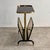 A refined Italian coffee table/side table with a built-in magazine rack dating back to the 1950s and 1960s. The piece...