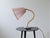 An typical Art Deco look of this table lamp made in Sweden during the 1970s. It has a nice looking organic rod and a...