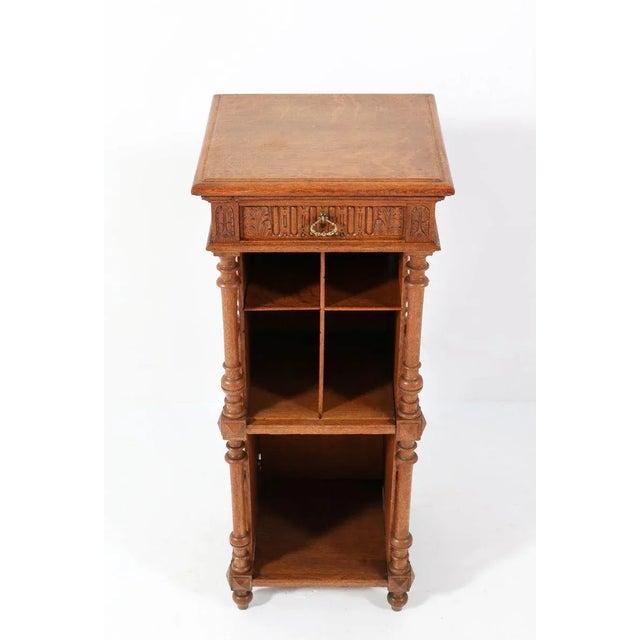 Wonderful and high quality Henri II cabinet. Striking French design from the late 19th century. Solid oak with original...