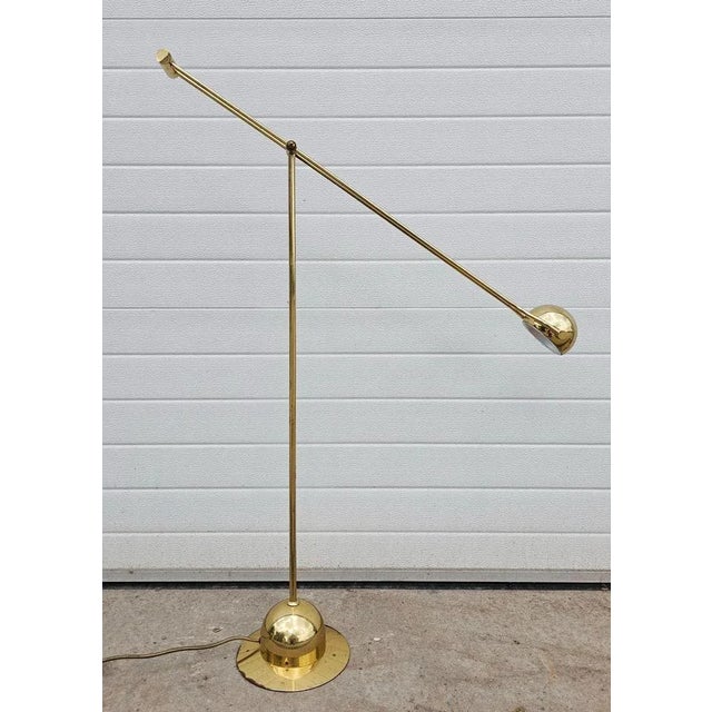 In this listing you will find a rare Mid Century Modern Floor Lamp. It's completely done in brass and features very...