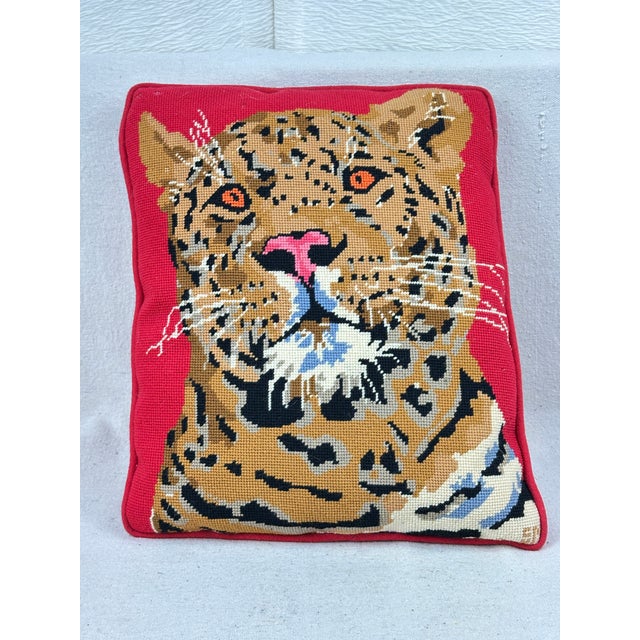 Add a vibrant pop of color and retro charm to your space with this stunning vintage handmade needlepoint pillow. Featuring...